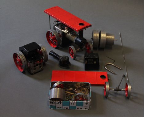 A Mamod 1 steam engine plus spares including canopy etc, rollers from 1965 engine & a box of steam engine parts including ste