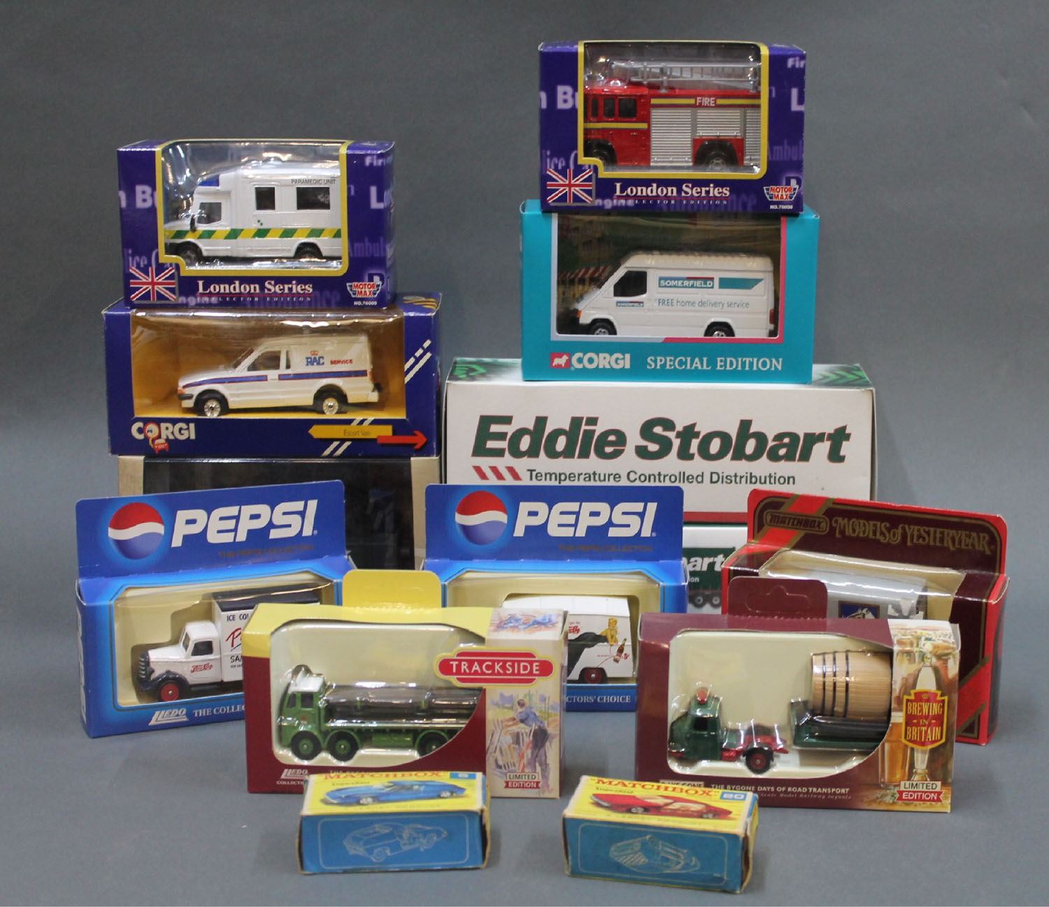 A small collection of boxed diecast model vehicles 