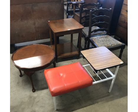 Two oak ladderback dining chairs, a mahogany lamp table, a mahogany tea trolley and a telephone seat