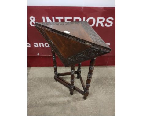 A Victorian Jacobean Revival oak gateleg lamp table 