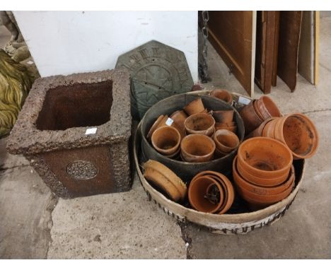 Assorted terracotta plant pots, two sieves, salt glazed concrete garden planter and a sun dial