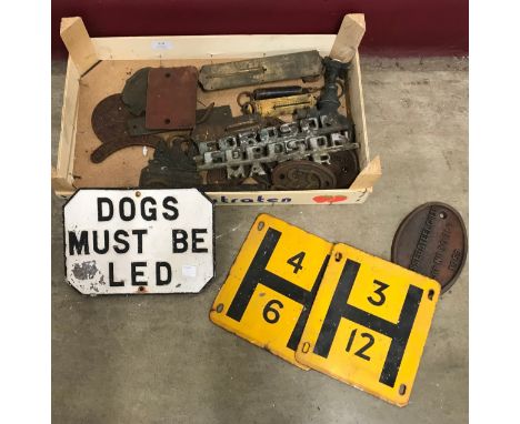 Assorted metalware including cast iron plates and signs 