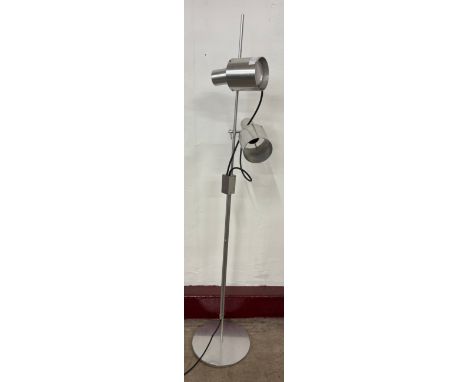 A Peter Nelson chrome effect floor standing spotlight lamp, requires re-wiring 