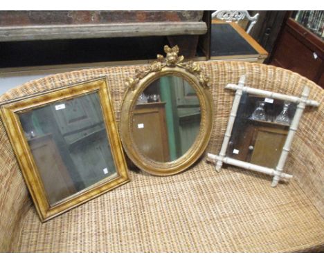 A Rococco style gilt frame mirror, a simulated bamboo frame mirror and another mirror (3)  