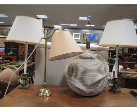 A large ceramic table lamp and three other lamps  
