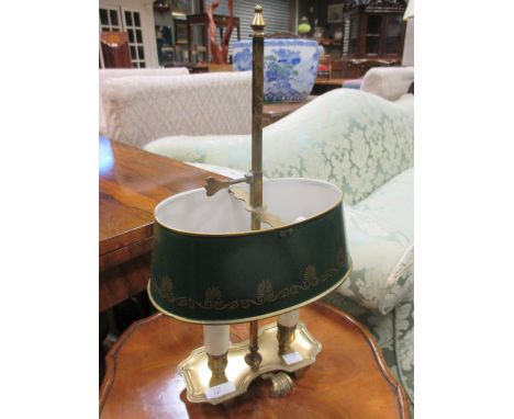 A brass student lamp with green tin plate adjustable shade  