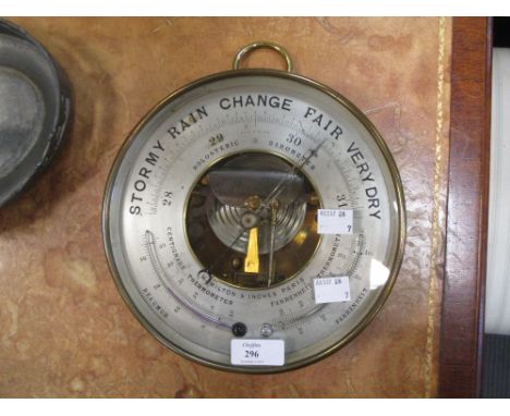 A brass cased combination barometer/thermometer, diameter 20.5cm  