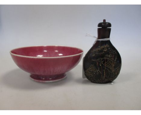 A Chinese horn snuff bottle and a pink studio ceramic bowl  