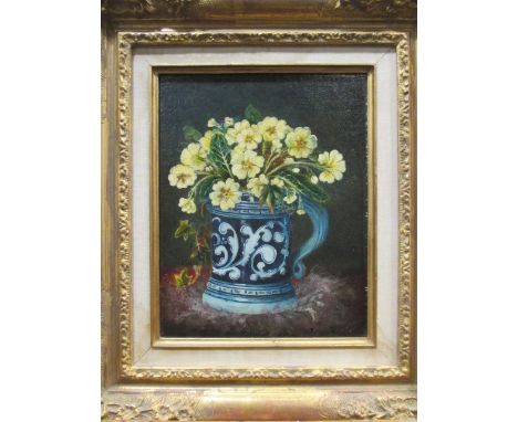 Margaret E. Wilson (British, 19th century) Still life of primroses in a mug, oil on canvas, signed and dated 1881, 23 x 18cm;