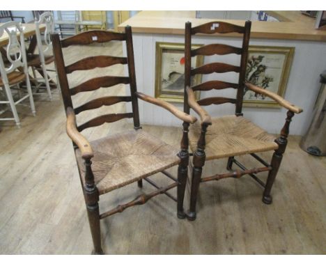 A set of six Lancashire pattern ladder back chairs  