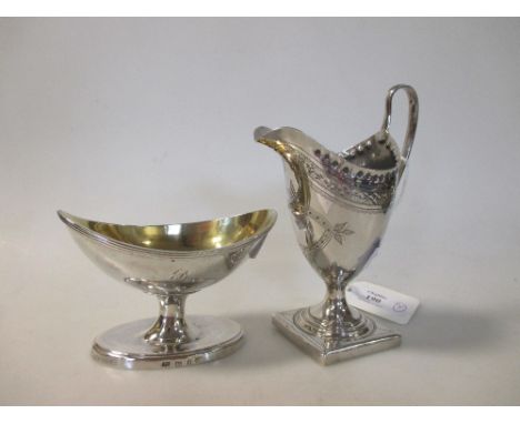 A Georgian silver salt with gilt bowl, TL, Sheffield 1801 together with a Georgian silver creamer jug, Peter and Anne Bateman