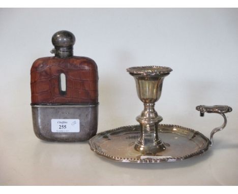 A Victorian silver chamberstick and a crocodile leather mounted silver & glass hip flask  