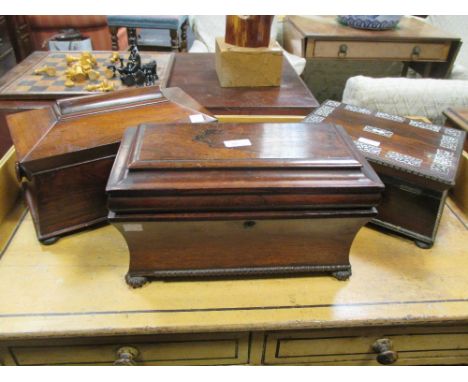 A Victorian rosewood sarcophagus tea caddy, another caddy and a sewing box (3)  