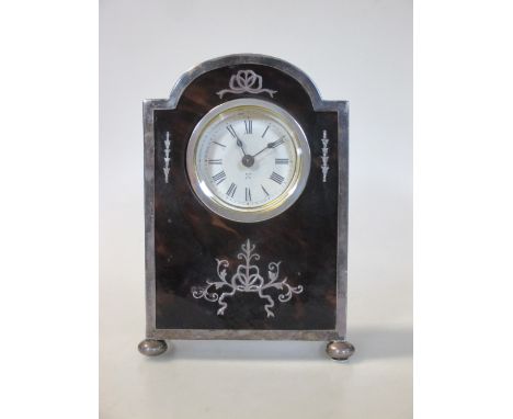 A silver mounted tortoiseshell table clock  