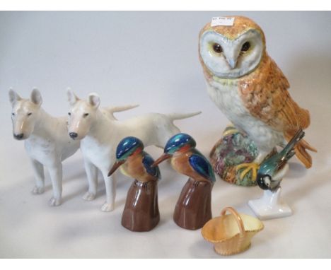 A Beswick model of an owl, 19.5cms, a Royal Copenhagwen model of a bull terrier 19.5cms long, another (a/f), two Doulton mode