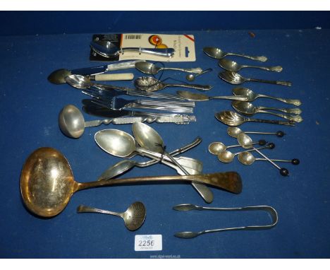 A small quantity of plated cutlery including ladle, grapefruit spoons, sugar tongs etc.