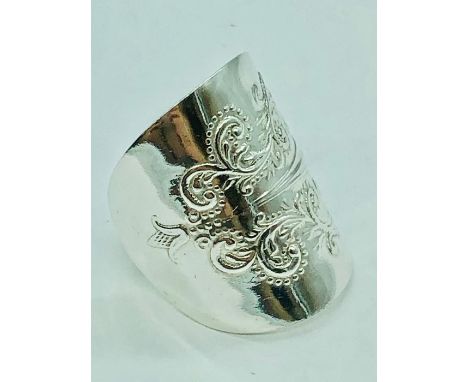 A hallmarked silver spoon ring handcrafted by Boochi and Co from antique silver cutlery, each ring being unique, (re-sizing a