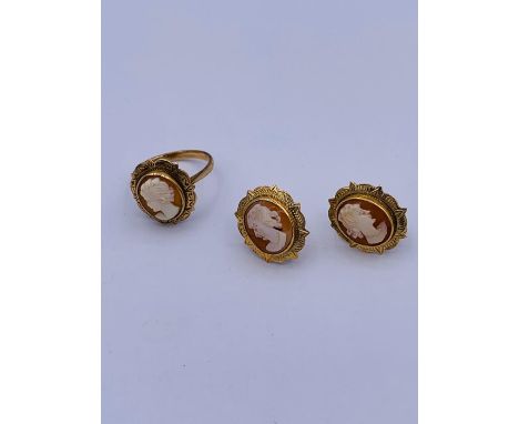 A 9ct yellow gold ring and earrings with Cameos.