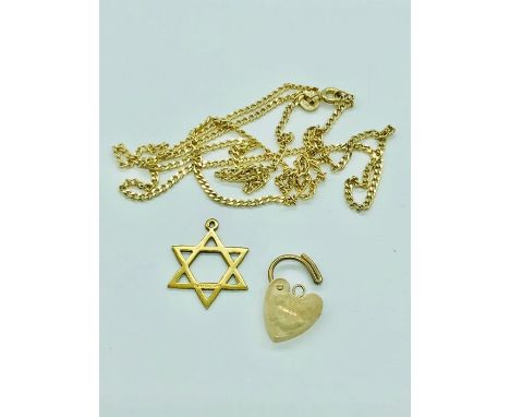 A 9ct yellow gold chain and two 9ct pendants (4.1g)