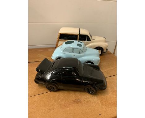 Three decorative ceramic cars