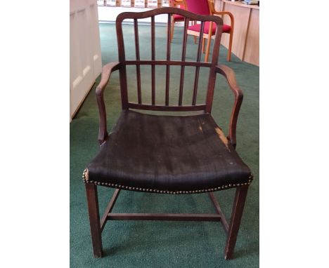 A 19th Century mahogany frame Elbow Chair with rail back, upholstered seat and square supports with the inventory label of Si