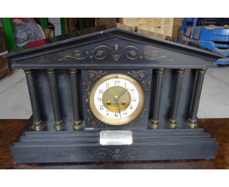 A Victorian Mantel Clock with white dial in architectural style black marble case, the dial inscribed 'Dallas, Inverness' and