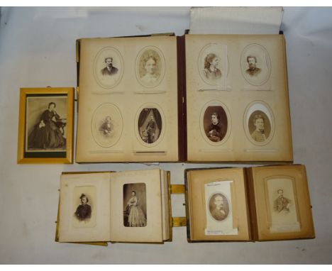 A 19th Century leather Photograph Album containing portrait photographs, mostly Polish, two smaller photograph albums with si