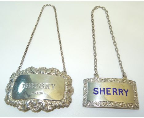 A silver and blue enamel Decanter Label, 'Sherry' and another 'Whisky'.