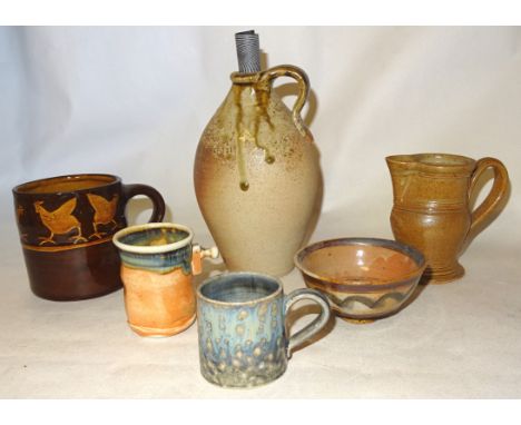 A Muchelney Studio Pottery stoneware Flagon by John Leach.  7" (17cms) high, a small Studio Pottery bowl by Seth Cardew, a St