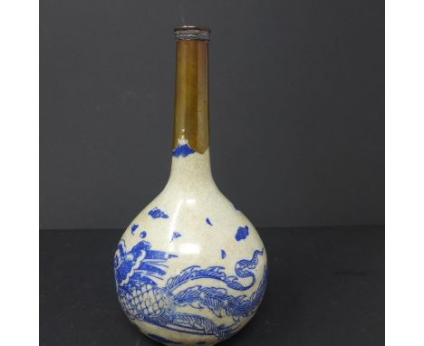 An early 20th century Chinese crackle glazed blue and white vase, decorated with phoenix, scrolls and clouds, with later bras