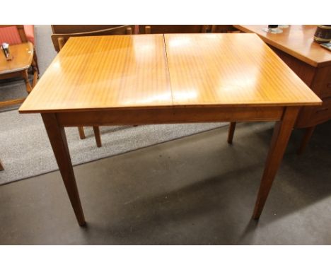 A 1960's light elm extending dining table, 78cm x 107cm