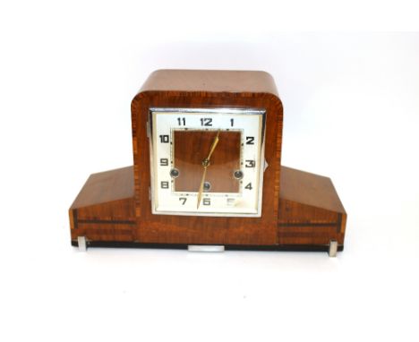 An Art Deco walnut and cross banded chiming mantel clock, 38.5cm wide x 25cm high