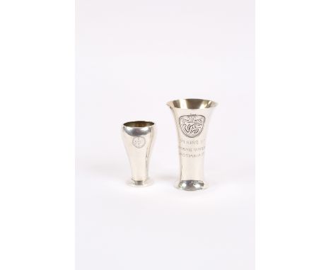 A Scandinavian white metal trumpet shaped small spill vase, decorated motif and inscribed "Pekin two and two Den Praemievner 