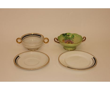 A Shelley Art Deco design, black, white and gold soup bowl and plate; and a Carltonware  green floral decorated soup bowl 