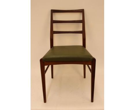 A set of four G-plan ladder back dining chairs 