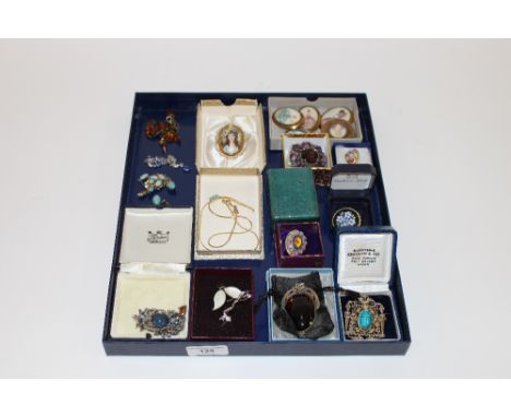 A collection of various costume jewellery to include Middle Eastern brooch with scarab beetle decoration, micro mosaic brooch