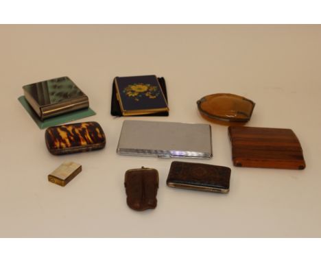 Various smoking related items including a Kigu cigarette case; a cheroot and cigarette holder in leather case; various cigare
