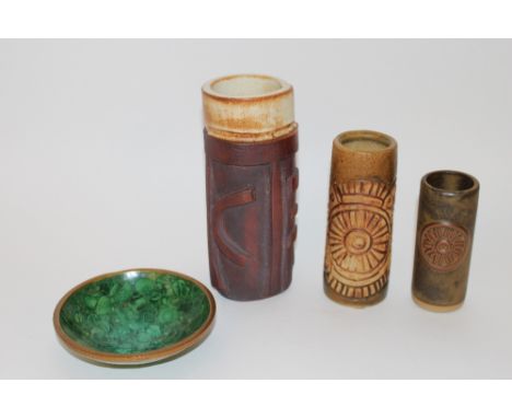 A Bernard Rooke cylindrical stoneware vase; a Treamar similar; a larger unmarked Studio pottery vase; and a Malachite and bra