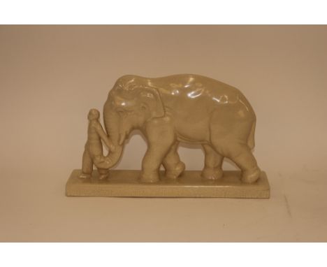 An L & V ceramic figure of an elephant and Mahoot, 46cm long 