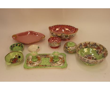 A collection of Maling ware, to include dressing table items and fruit bowls in the Rosalind, Peony Rose, and Rosine patterns