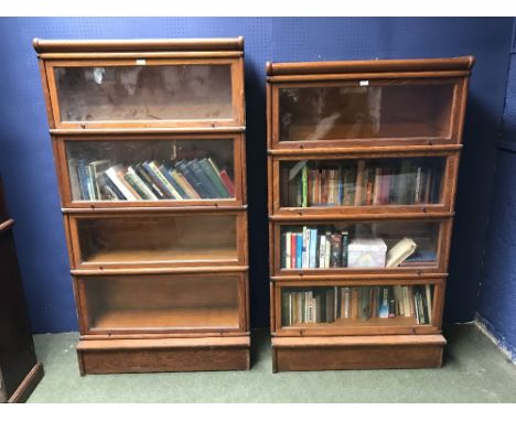 Two oak, 4 shelved Globe Wernicke bookcases 
