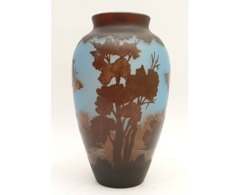 A Galle TIP vase, cylindrical vase decorated with butterflies and parkland, set against a blue ground, H-31cm.