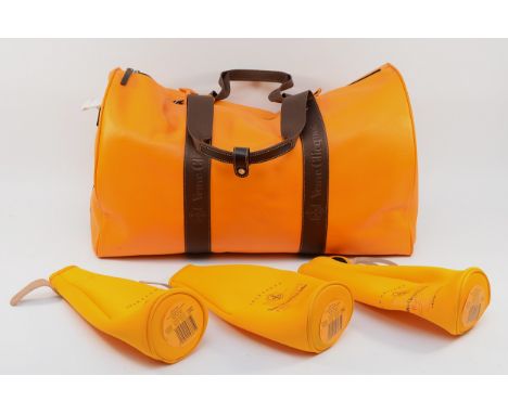 Veuve Clicquot, an unused soft hold all bag, 45 x 30 x 26cm, three single bottle holders, an umbrella, together with a vintag