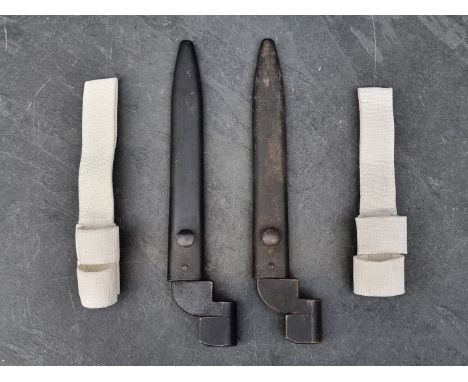 Two British Army No.9 bayonets and scabbards, with frogs. 
