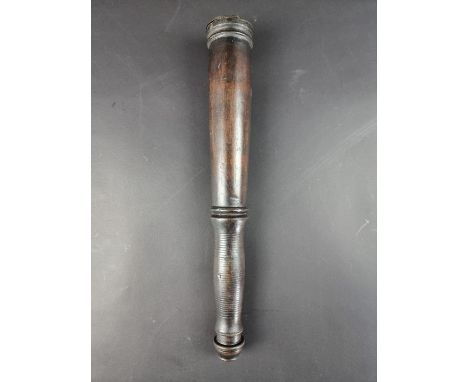 A hardwood truncheon, having embossed brass plaque to end, 34cm long.