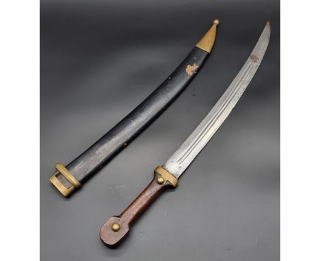 A WWI Russian bebut kindjal short sword and scabbard, with 43cm curved fullered blade, stamped '1916' and 'A A' for Artin Fac