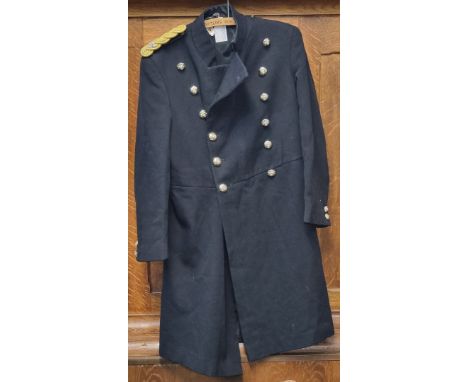 A British army frock coat, possibly a Band Masters, with epaulettes for a Major.