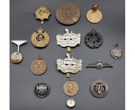An RAF silver and enamel sweetheart brooch, 55mm; together with a Lusitania Medal; an RAF cap badge; an escape compass; and v