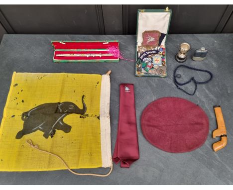 A circa 1950s British&nbsp;airborne beret and badge;&nbsp;together with a&nbsp;unit flag; a boxed Malayan paper knife; a smal