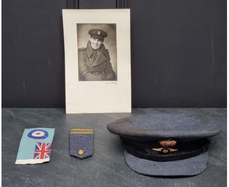 A rare WWII RAF Padre or Chaplains peaked cap and badge, by Burberrys of London; together with a pair of great coat epaulette